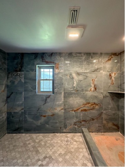 Natural stone shower tiling installed by Flooring Depot of Panama City